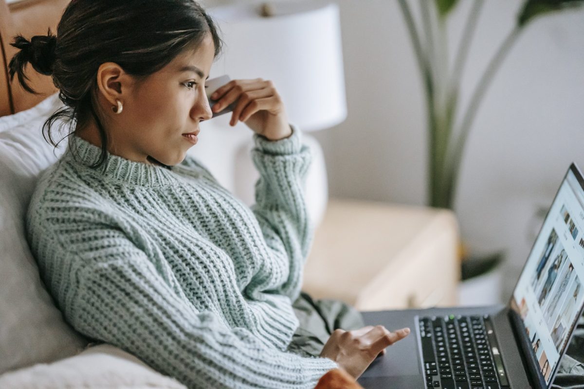 Photo by Liza Summer from Pexels: https://www.pexels.com/photo/focused-young-ethnic-woman-with-credit-card-and-laptop-6348124/