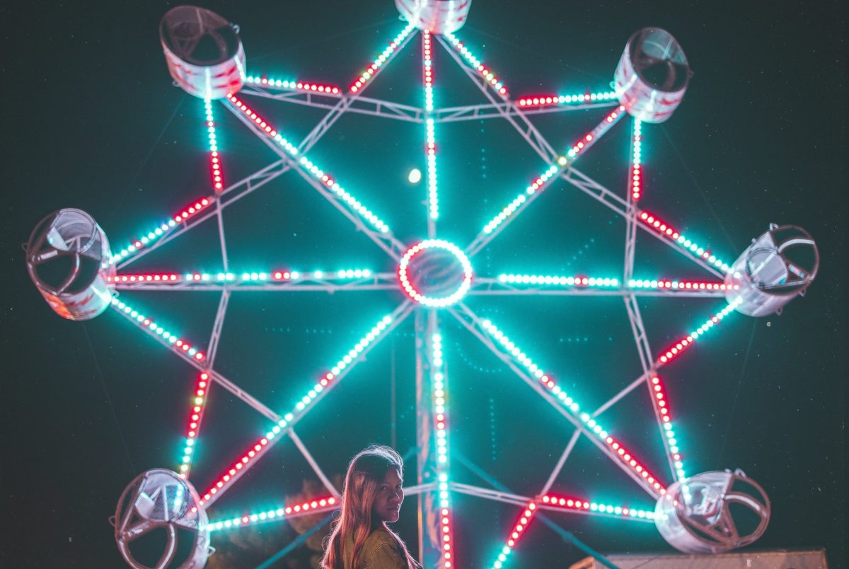 Photo by clark cruz from Pexels: https://www.pexels.com/photo/ferris-wheel-at-night-2911364/