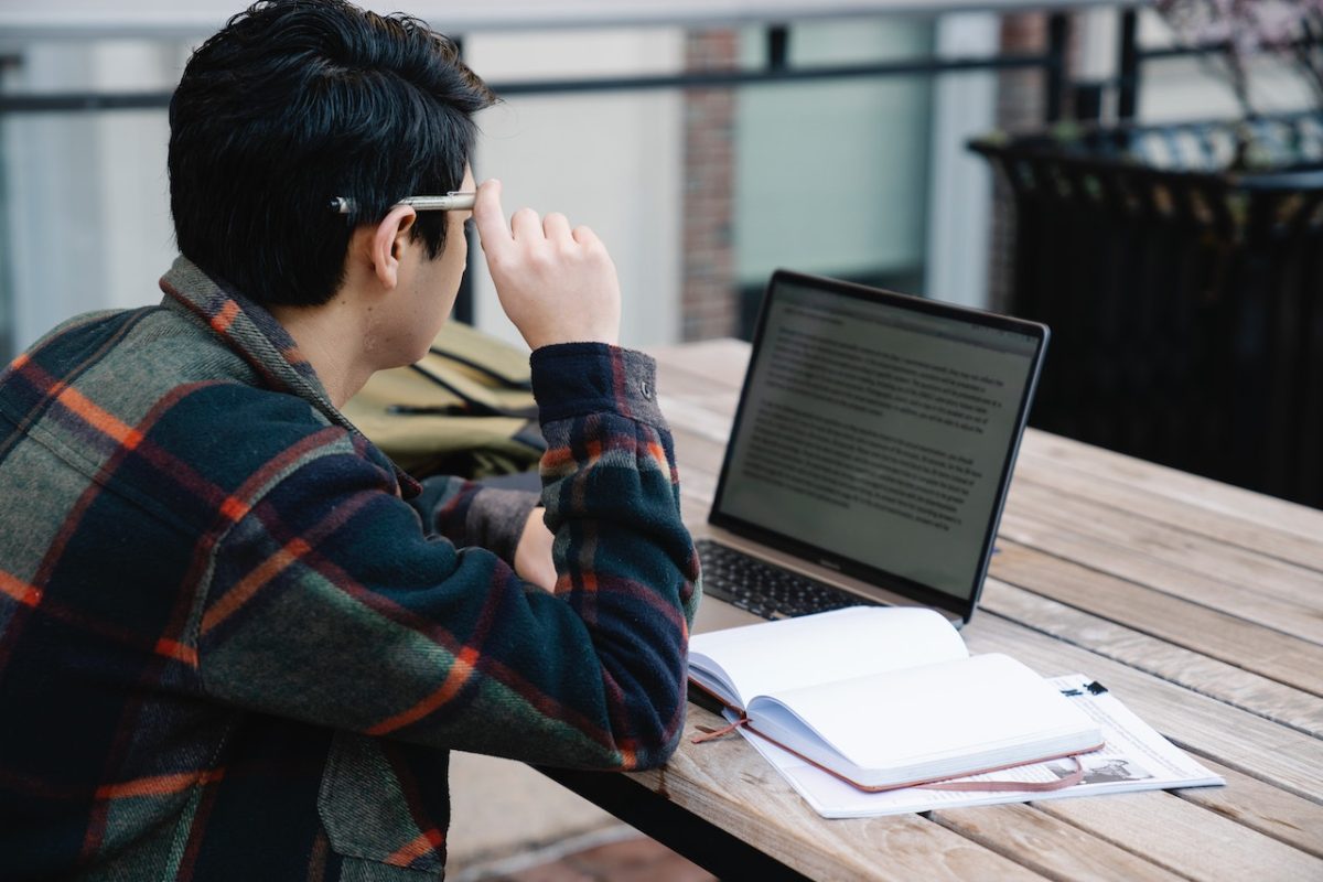 Photo by George Pak : https://www.pexels.com/photo/photo-of-a-man-reading-on-his-laptop-7972359/