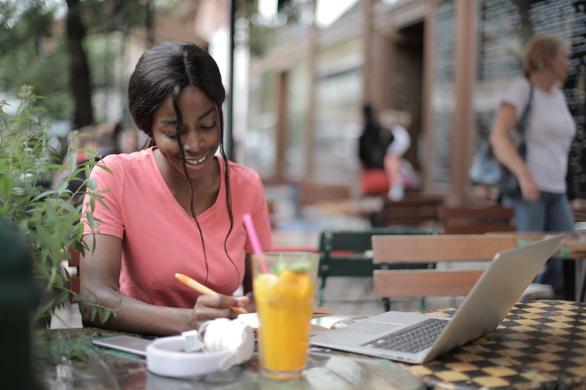 Photo by Andrea Piacquadio: https://www.pexels.com/photo/woman-in-pink-scoop-neck-shirt-sitting-by-the-table-3802021/