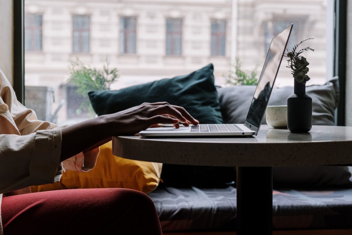 Photo by cottonbro studio: https://www.pexels.com/photo/person-in-red-pants-sitting-on-couch-using-macbook-5054213/