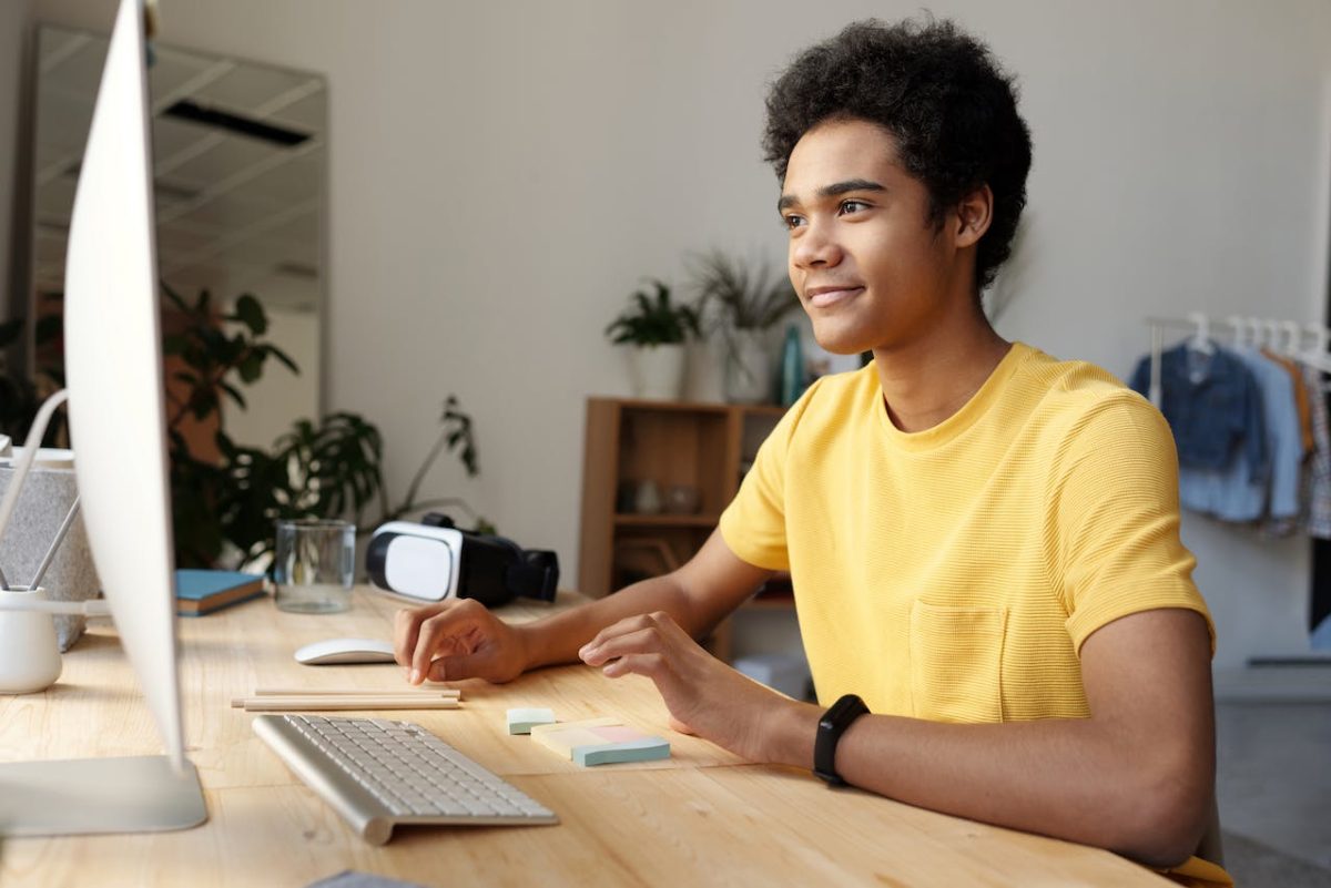 Photo by Julia M Cameron: https://www.pexels.com/photo/photo-of-boy-wearing-yellow-shirt-while-using-an-imac-4144144/